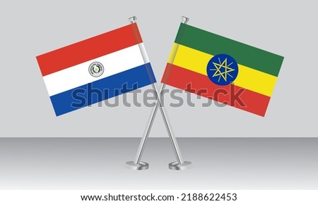 Crossed flags of Paraguay and Ethiopia. Official colors. Correct proportion. Banner design