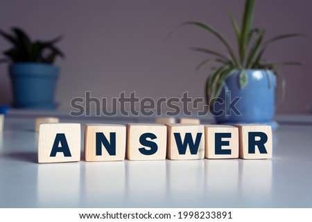 Wooden Blocks with the text: Answers. Questions and answers support desk Expert consulting business concept. Stock foto © 