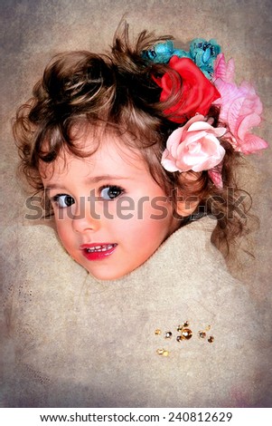 Beautiful girl with flowers in  hair
