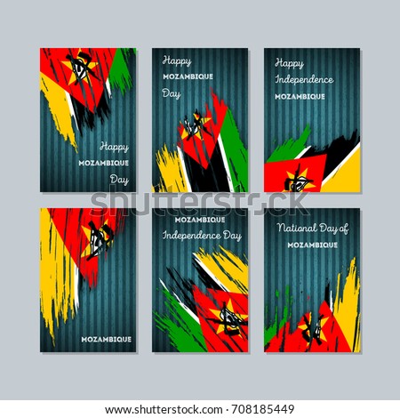 Mozambique Patriotic Cards for National Day. Expressive Brush Stroke in National Flag Colors on dark striped background. Mozambique Patriotic Vector Greeting Card.