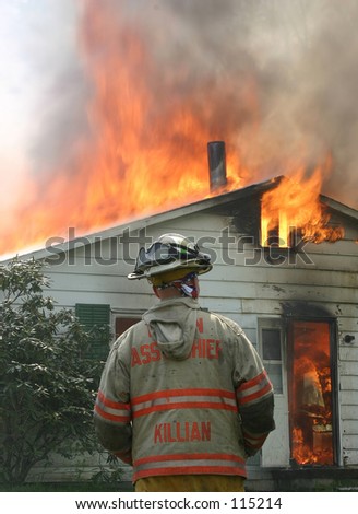 Assistance Fire Chief overlooking fire