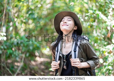 Similar – Image, Stock Photo Walking in the forest. Walk in the forest. Resting on the tree trunk.
