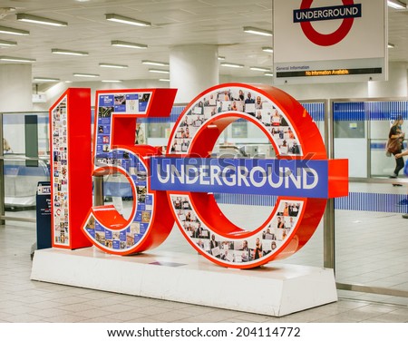 LONDON, UNITED KINGDOM - SEPTEMBER 01, 2013: London Tube Underground celebrates its 150 anniversary. To mark this date of the London\'s tube system, giant signs are exposed in stations.