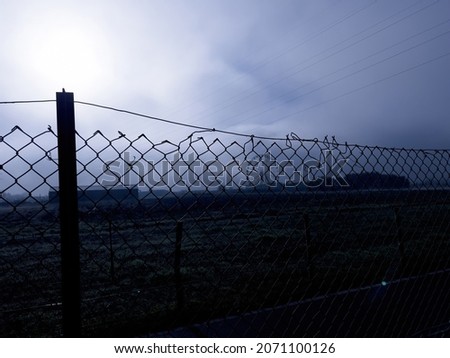 Similar – Image, Stock Photo barbed wire and carousel in amusement park in Chernobyl