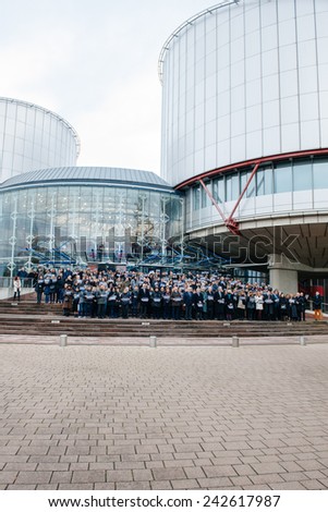 STRASBOURG, FRANCE - 8 JAN 2015: European Court of Human Rights President Dean Spielmann and Registrar Erik Fribergh, judges and jurists observe a minute of silence for Charlie Hebdo