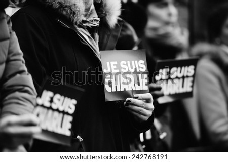 STRASBOURG, FRANCE - JAN 09, 2015: Council of Europe employees and Thorbjorn Jagland - Secretary General of the CE attend to a silent vigil to condemn the gun attack at French magazine Charlie Hebdo