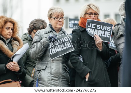 STRASBOURG, FRANCE - JANUARY 09, 2015: Council of Europe employees attend to a silent vigil to condemn the gun attack magazine Charlie Hebdo office in Paris, which killed 12 people on January 7, 2015