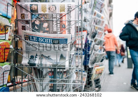 STRASBOURG, FRANCE - 10 JAN, 2015: The front covers of International newspapers display headlining the terrorist attacks yesterday in Paris on January 8, 2015