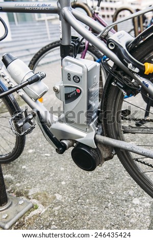 FRANKFURT, GERMANY - MARCH 03, 2014: Electric bicycle motor detail in urban environment. In Germany they are gaining in popularity and taking some market share away from conventional bicycles