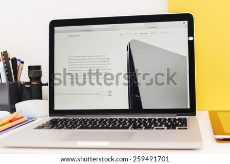 PARIS, FRANCE - MAR 10, 2015: Apple Computers website on MacBook Retina in room environment showcasing  USB-C connector page as seen on 10 March, 2015