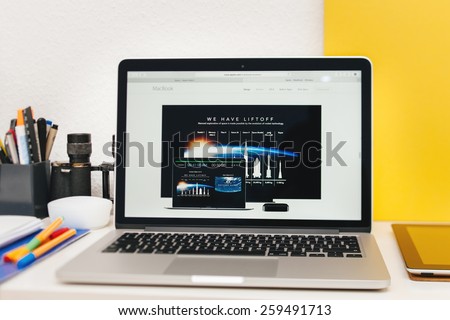 PARIS, FRANCE - MAR 10, 2015: Apple Computers website on MacBook Retina in room environment showcasing new MacBook page as seen on 10 March, 2015