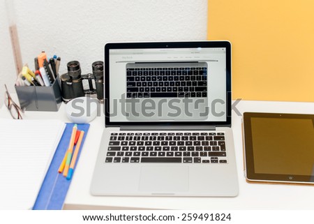 PARIS, FRANCE - MAR 10, 2015: Apple Computers website on MacBook Retina in room environment showcasing new Apple keyboard on a MacBook laptop as seen on 10 March, 2015 with tilt-shift lens