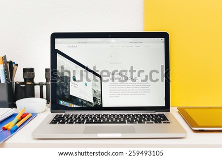 PARIS, FRANCE - MAR 10, 2015: Apple Computers website on MacBook Retina in room environment showcasing new MacBook Time Machine as seen on 10 March, 2015