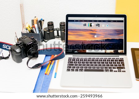 PARIS, FRANCE - MAR 10, 2015: Apple Computers website on MacBook Retina in photographer room showcasing Shot on iPhone 6 campaign as seen on 10 March, 2015