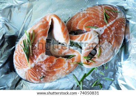 Preparing salmon steaks, mid section. Useful photo for you restaurant, cooking book or magazine.