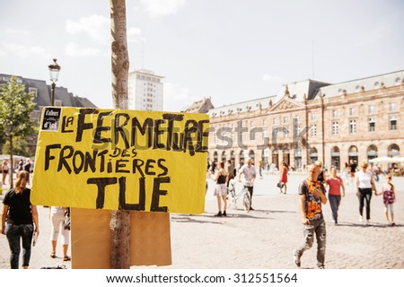 STRASBOURG, FRANCE - AUG 22 2015: People protesting against immigration policy and border management which asks for commitment in the wake of migrants boat disasters - closing borders kills