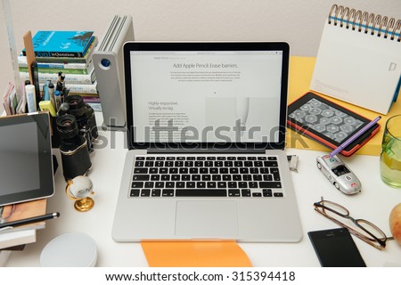 PARIS, FRANCE - SEP 10, 2015: Apple Computers website on MacBook Pro Retina in a creative room environment showcasing the newly announced Apple Pencil for iPad Pro