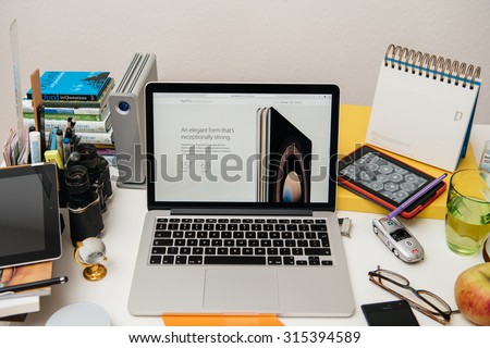 PARIS, FRANCE - SEP 10, 2015: Apple Computers website on MacBook Pro Retina in a creative room environment showcasing the newly announced iPad Pro and its specs
