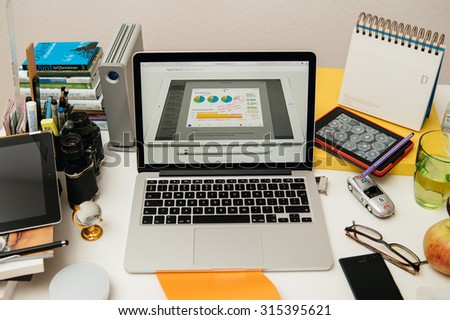 PARIS, FRANCE - SEP 10, 2015: Apple Computers website on MacBook Pro Retina in a creative room environment showcasing the newly announced Apple Pencil ipad Pro