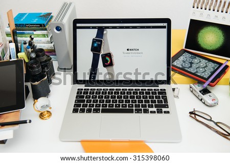 PARIS, FRANCE - SEP 10, 2015: Apple Computers website on MacBook Pro Retina in a creative room environment showcasing the newly improoved Apple Watch straps and colors