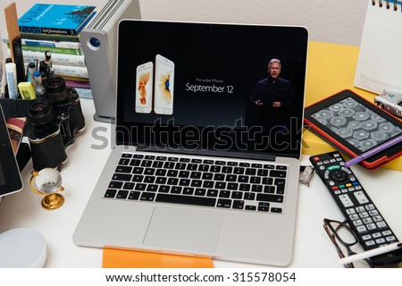 PARIS, FRANCE - SEP 10, 2015: Apple Computers website on MacBook Pro Retina in a creative room environment showcasing the newly announced iPhone 6s pre-order date