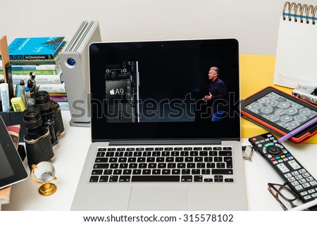 PARIS, FRANCE - SEP 10, 2015: Apple Computers website on MacBook Pro Retina in a creative room environment showcasing the newly announced A9 chip in Apple iphone 6s