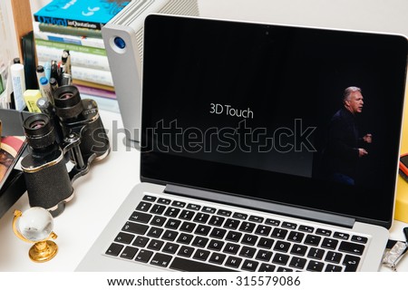 PARIS, FRANCE - SEP 10, 2015: Apple Computers website on MacBook Pro Retina in a creative room environment showcasing the newly announced 3D Touch by Phil Chiller
