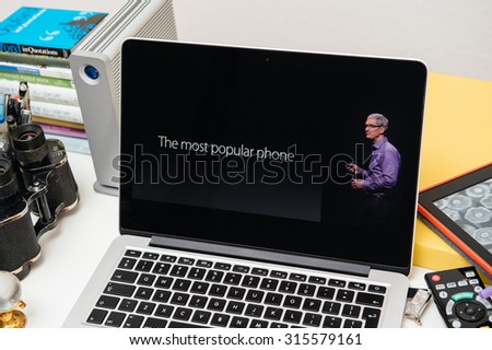 PARIS, FRANCE - SEP 10, 2015: Apple Computers website on MacBook Pro Retina in a creative room environment showcasing the newly announced the most popular phone