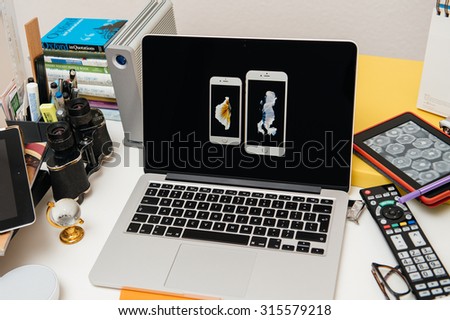 PARIS, FRANCE - SEP 10, 2015: Apple Computers website on MacBook Pro Retina in a creative room environment showcasing the newly announced iPhone 6s and iPhone 6s Plus