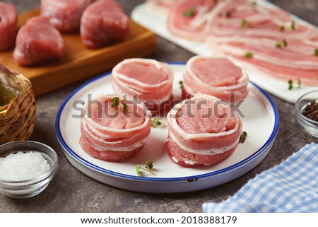 Similar – Image, Stock Photo raw pork tenderloin on a wooden cutting board