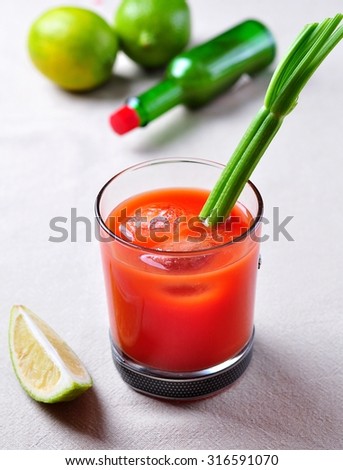 Bloody Mary cocktail with celery, Tabasco, pepper, sea salt and Worcestershire sauce