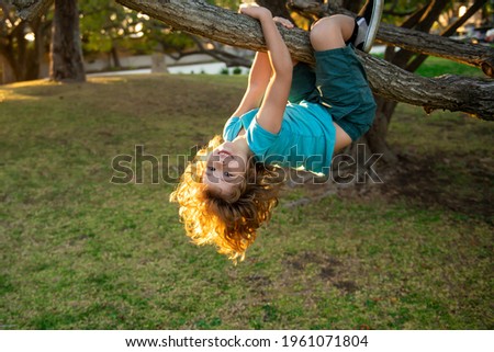 Similar – Image, Stock Photo Climbing a tree Parenting