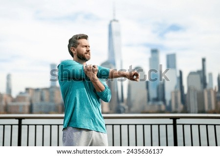 Similar – Image, Stock Photo Athletic man doing exercise at the beach.