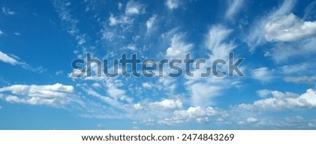 Similar – Image, Stock Photo cloudy blue sky and different buildings