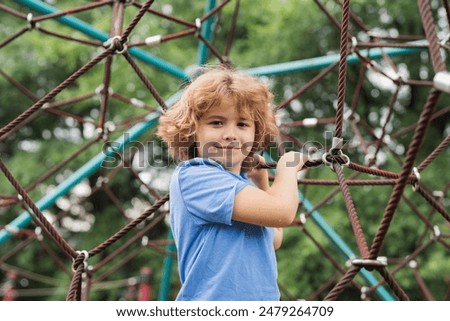 Similar – Image, Stock Photo Child playing with rocks and sand