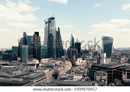 Stock photo taken of the London cityscape from the top of a building to the skyscrapers of the financial district