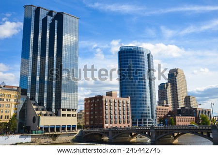 Grand Rapids, Michigan - October 10, 2014:   Along the Grand River in Grand Rapids, Michigan, are three of the city\'s largest hotels:  Amway Grand Plaza, JW Marriott, Courtyard by Marriott