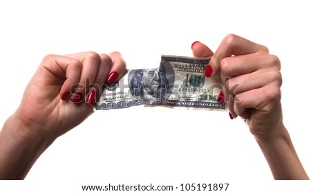 Photo of hands tearing apart dollar on white background