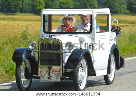 LANDSBERG, GERMANY - JULY 13: Oldtimer rallye for at least 80 years old antique cars with BMW Dixi Cabriolet, built at year 1929, photo taken on July 13, 2013 in Landsberg, Germany