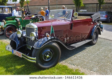 LANDSBERG, GERMANY - JULY 13: Oldtimer rallye for at least 80 years old antique cars with Wanderer W10 6-30 Cabriolet, built at year 1930, photo taken on July 13, 2013 in Landsberg, Germany
