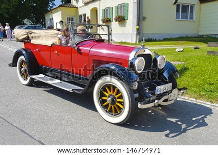 LANDSBERG, GERMANY - JULY 12: Oldtimer rallye for at least 80 years old antique cars with Cadillac V-63 Tourer Cabrio, built at year 1924, photo taken on July 12, 2013 in Landsberg, Germany