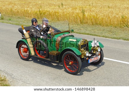 LANDSBERG, GERMANY - JULY 13: Oldtimer rallye for at least 80 years old antique cars with Swift Cycle Car, built at year 1914, photo taken on July 13, 2013 in Landsberg, Germany