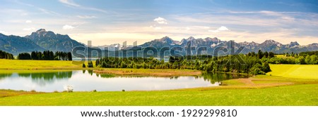 Similar – Image, Stock Photo Scenic landscape of lake surrounded by mountains in Spain