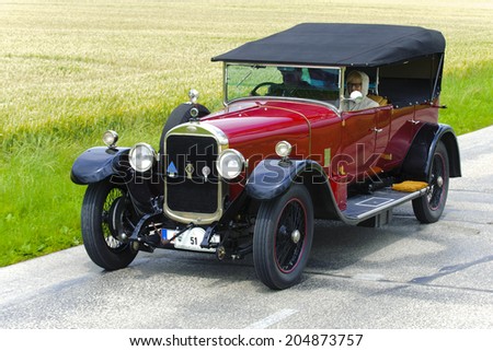 LANDSBERG, GERMANY - JULY 12, 2014: Public oldtimer rally organized by Bavarian city Landsberg for at least 80 years old veteran cars with unknown drivers in Sunbeam 25 HP Tourer, built at year 1926
