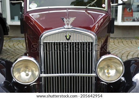 LANDSBERG, GERMANY - JULY 12, 2014: Public oldtimer rally in Bavarian city Landsberg for at least 80 years old veteran cars with a front view of Wanderer W10, built at year 1930