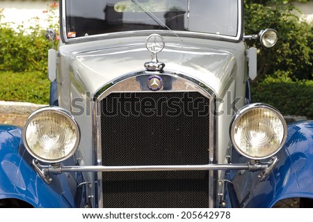 LANDSBERG, GERMANY - JULY 12, 2014: Public oldtimer rally in Bavarian city Landsberg for at least 80 years old veteran cars with a front view of Mercedes Stuttgart, built at year 1930