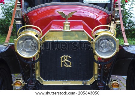 LANDSBERG, GERMANY - JULY 12, 2014: Public oldtimer rally in Bavarian city Landsberg for at least 80 years old veteran cars with a front view of Rochet-Schneider, built at year 1912