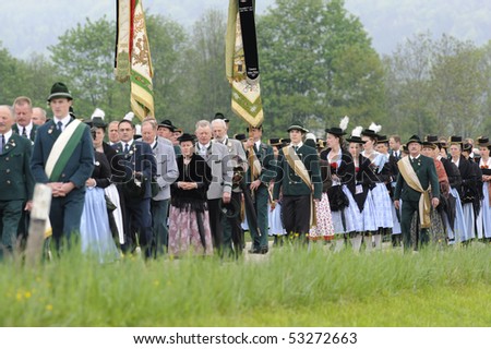 CHIEMGAU, GERMANY - MAY 13: yearly catholic procession with pilgrims in traditional bavarian costume, May 13, 2010 in Chiemgau, Germany, Bavaria
