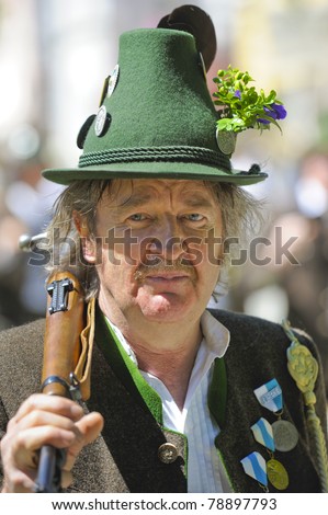 TRAUNSTEIN, GERMANY - MAY 8:  annual public parade of ca. 3500 performers in historical costumes and old weapons in commemoration of ancient bavarian soldiers - May 8, 2011 in Traunstein, Germany