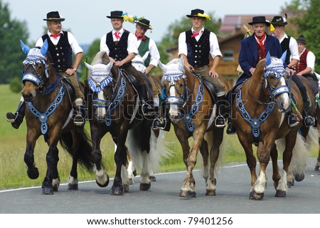 BAD KOETZTING, GERMANY - JUNE 13: 950 rider and horses took part at the biggest german annual and 599th religious horse procession -Pfingstritt- at June 13, 2011 in Bad Koetzting, Germany
